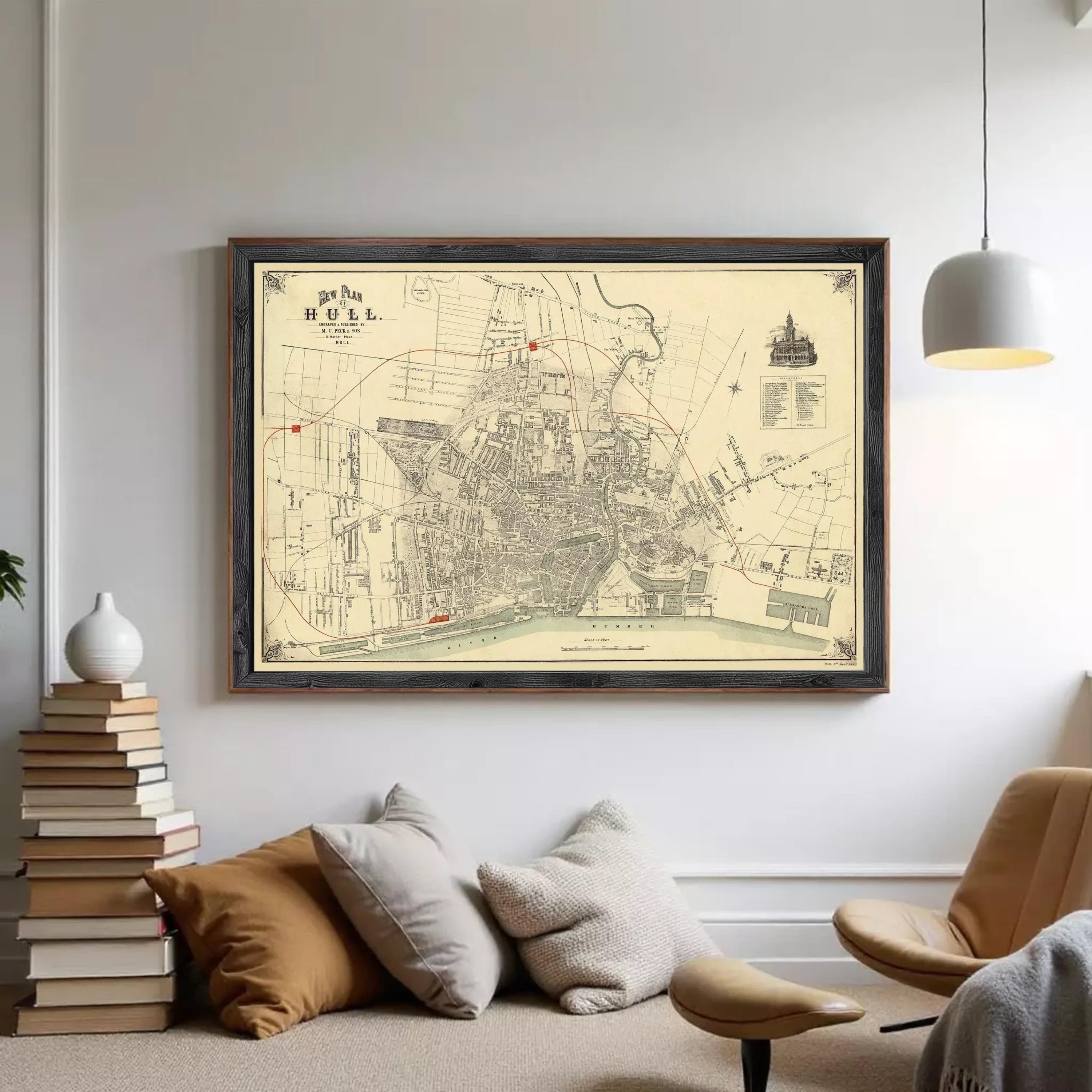 The image is a framed vintage map of a city, depicting streets, buildings, and other urban elements.