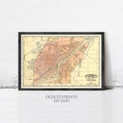 The image is a framed vintage map of a city, likely Toledo, Ohio, with a black border and a yellow and orange color scheme.