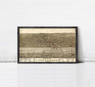 The image is a framed vintage map of Cleveland, Ohio, depicting the city's layout and surrounding areas.