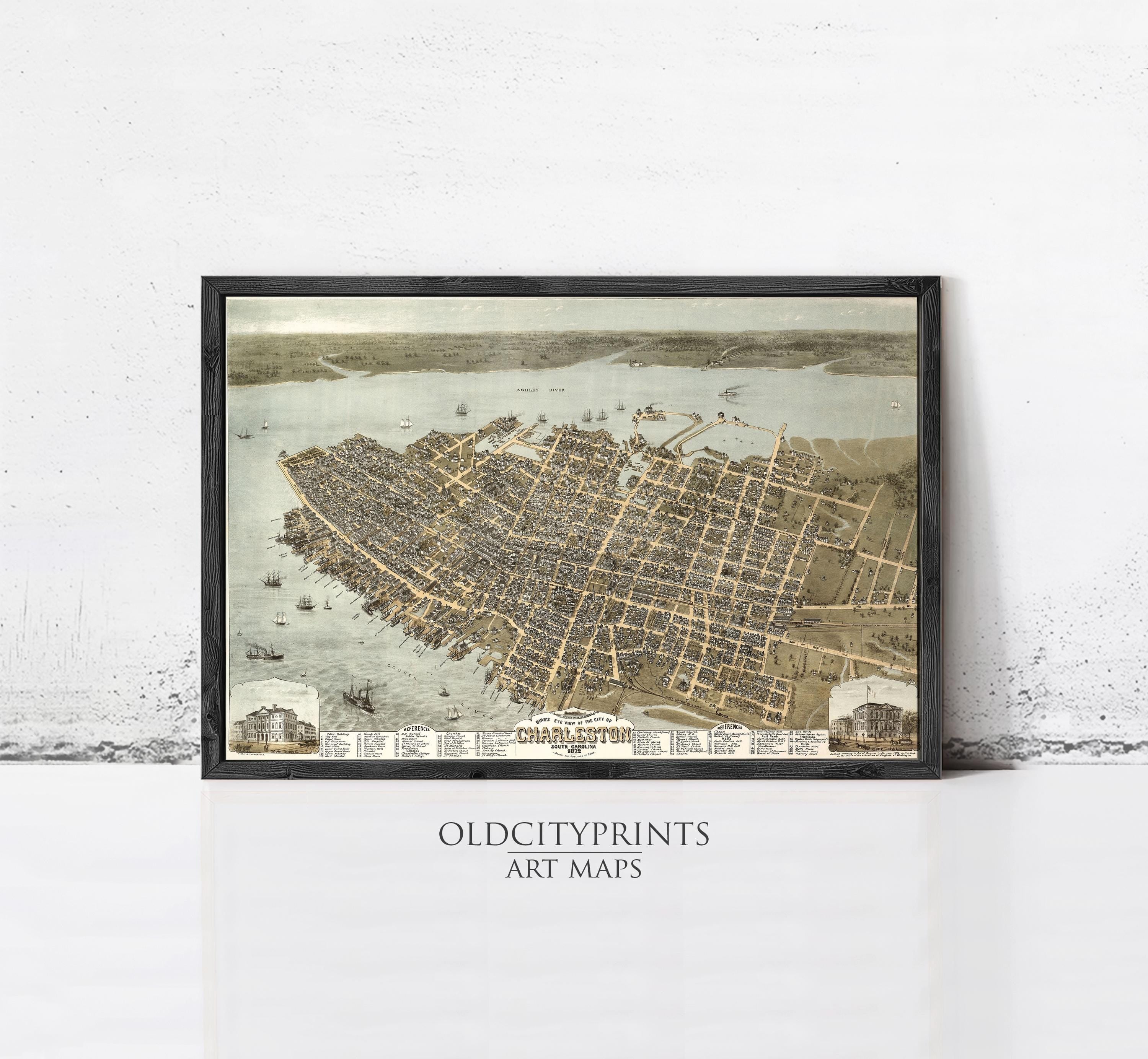 The image is a framed vintage map of a city, likely from the 19th century, depicting a densely populated urban area with numerous buildings, roads, and waterways.
