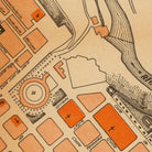The image is a detailed map of a city, showing various buildings, streets, and landmarks.