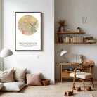a cozy living room with a large framed map of Providence, Rhode Island, hanging on the wall. The room is furnished with a wooden chair, a bookshelf filled with books, and a lamp. The overall decor has a warm and inviting atmosphere.