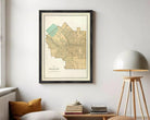 A framed map of the city of Syracuse, New York, with a vintage style and a light brown color scheme.