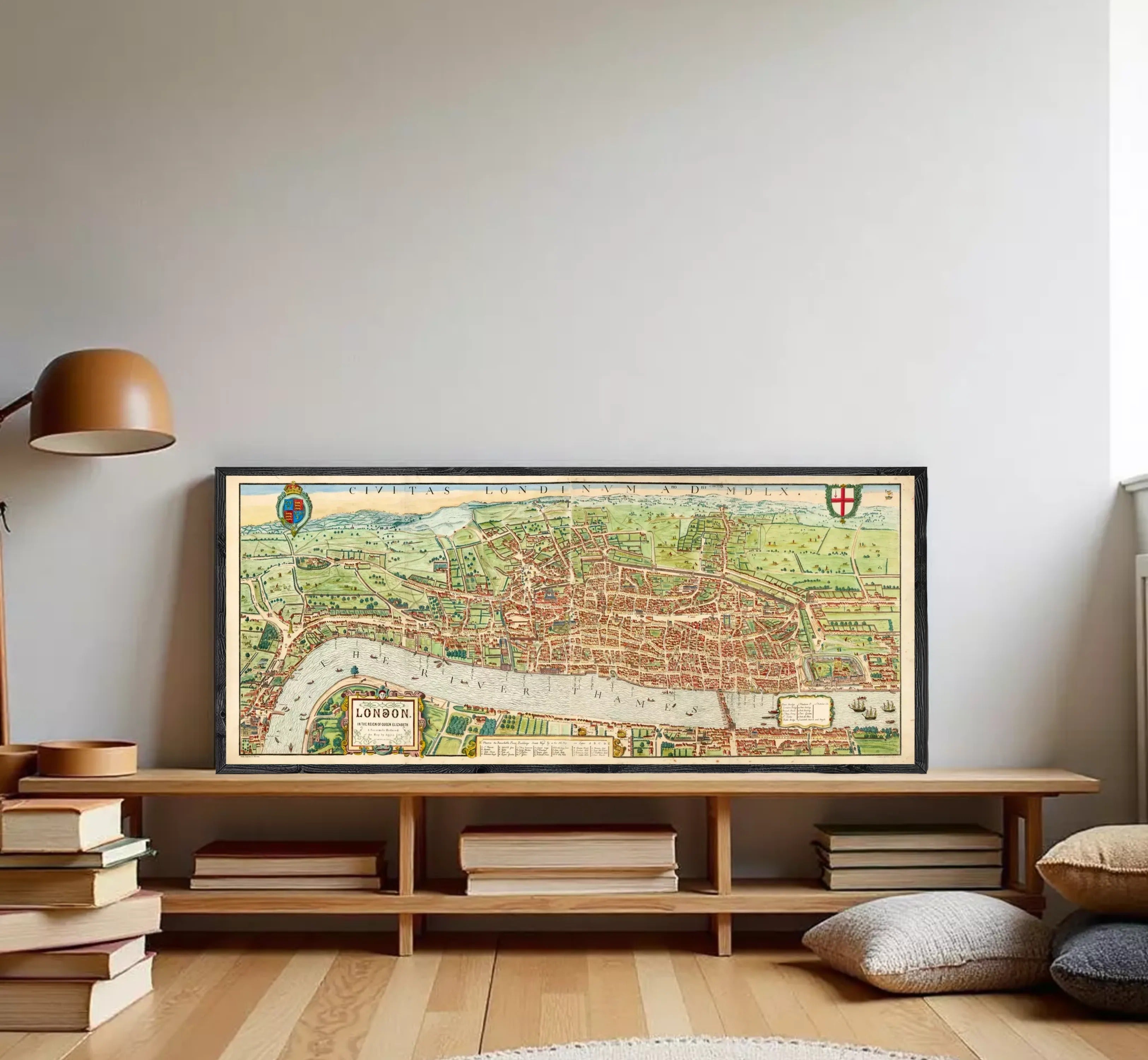 A framed map of London, featuring a detailed illustration of the city's streets, landmarks, and surrounding areas.