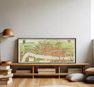 A framed map of London, featuring a detailed illustration of the city's streets, landmarks, and surrounding areas.