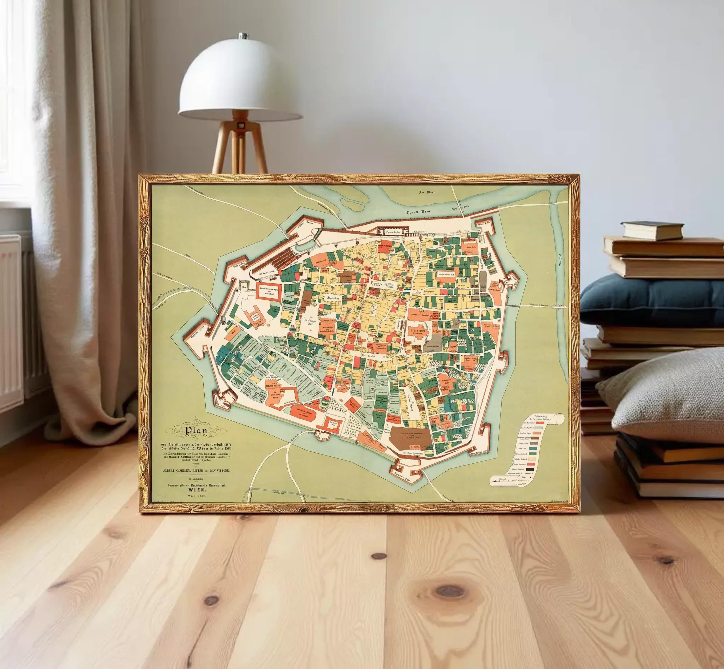 The image is a framed map of a city, likely a historical or geographical map, displayed on a wall.