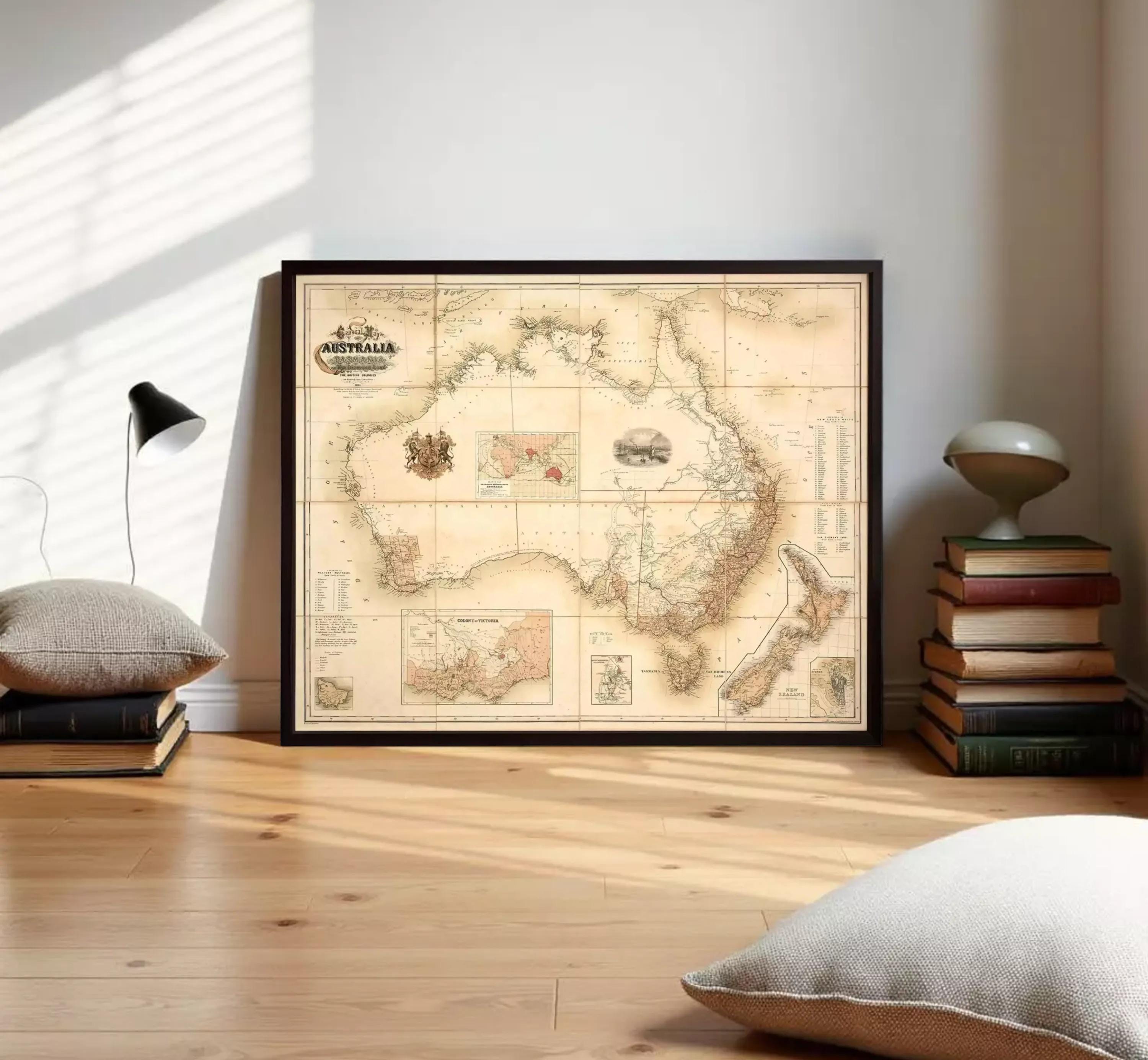 The image is a framed vintage map of Australia and New Zealand, depicting the geographical layout and boundaries of the countries in a sepia-toned style.