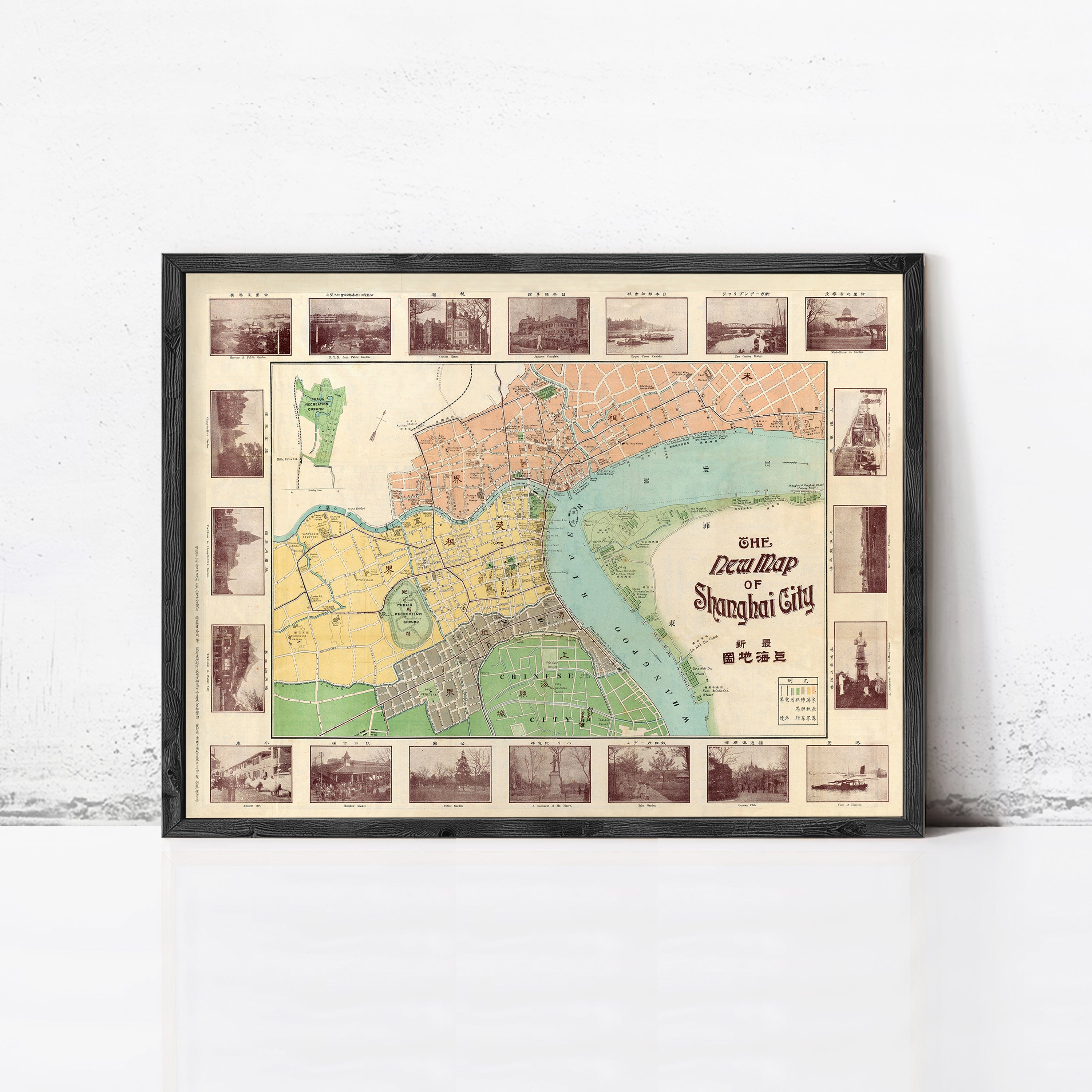 The image is a framed vintage map of Shanghai, China, depicting the city's streets, landmarks, and waterways.