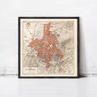 The image is a framed vintage map of the city of Athens, Greece, depicting the city's streets and landmarks in a detailed and colorful manner.