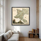 The image is a framed antique map of France, depicting a mountainous region with a river and a small town.