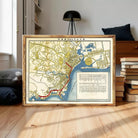 The image is a framed map of a city, likely Hong Kong, with various streets and landmarks depicted.