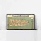 A framed vintage map of the island of Puerto Rico.