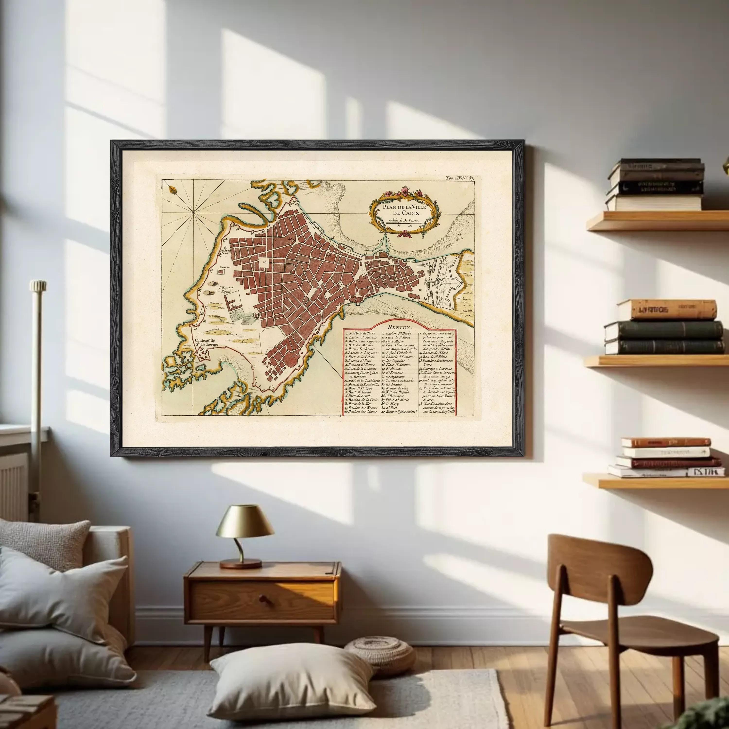 The image is a framed vintage map of a city, likely from the 16th century, depicting a detailed layout of the city's streets and surrounding areas.