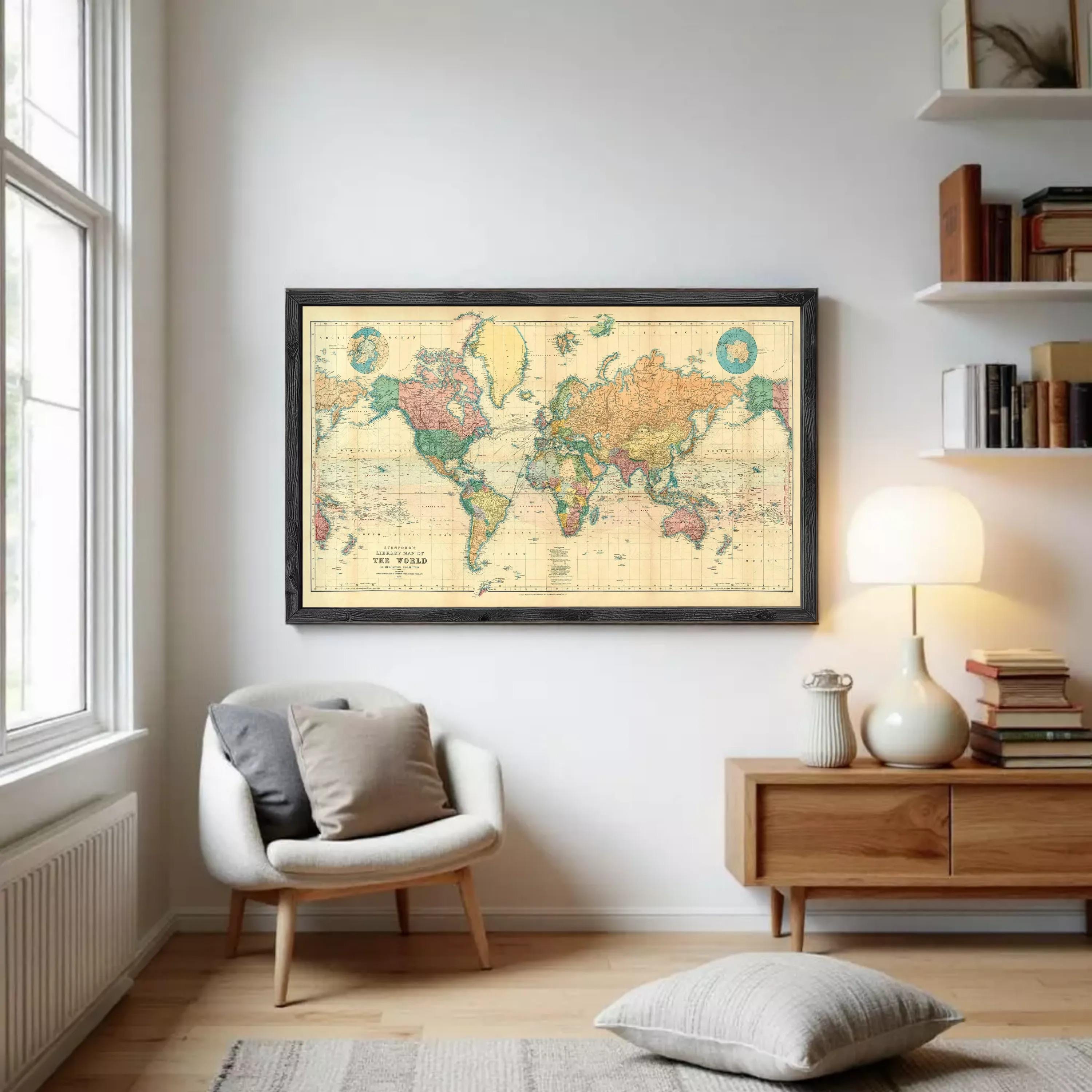 The image is a framed vintage world map depicting the continents and oceans in a color palette of green, yellow, and orange.