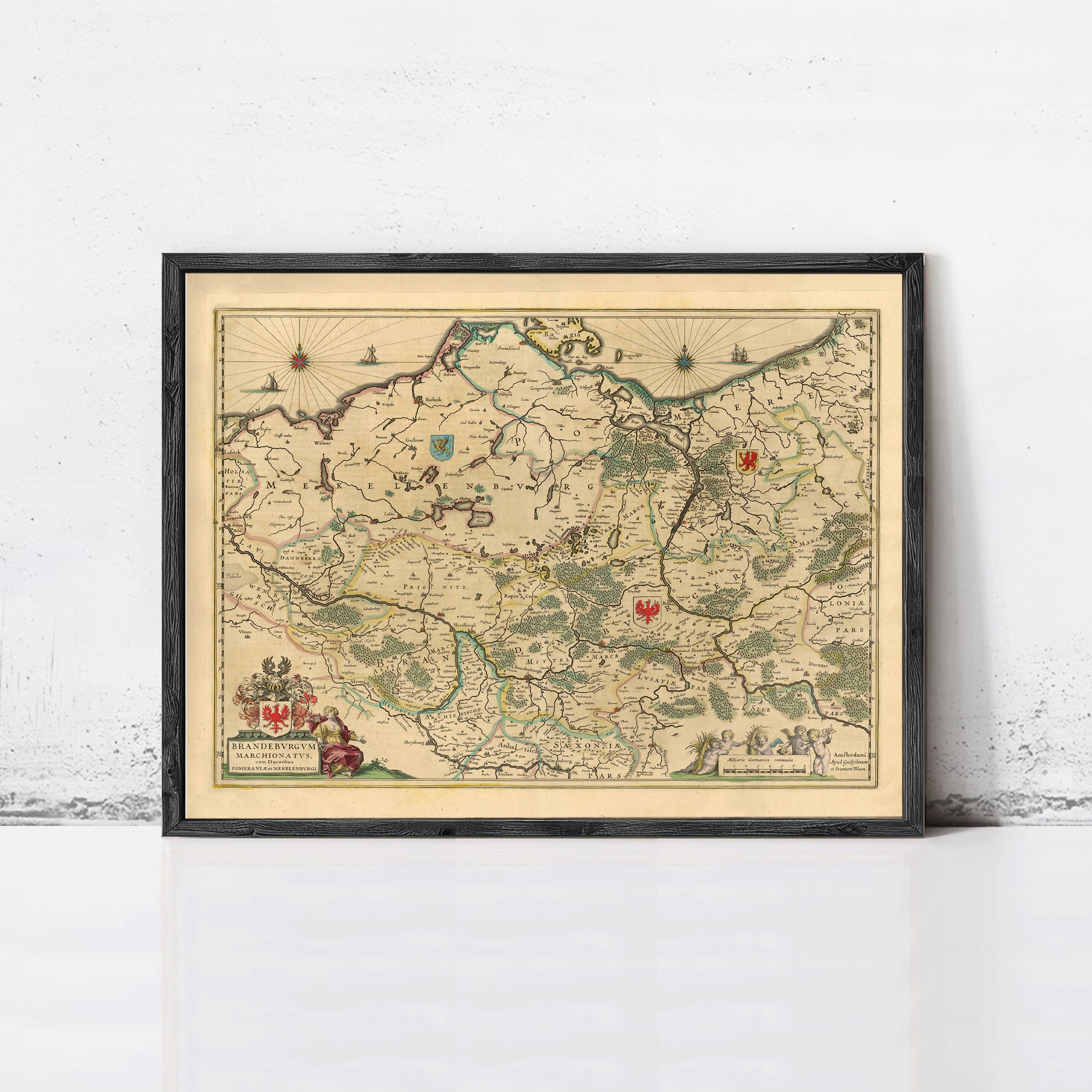 The image is a framed antique map of the region of Poland, featuring detailed geographical information and various landmarks.