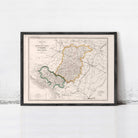 The image is a framed vintage map of a region, likely depicting a country or region, with various colored borders and detailed geographical information.