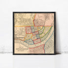 A framed vintage map of Cincinnati, Ohio, depicting the city's layout and surrounding areas.