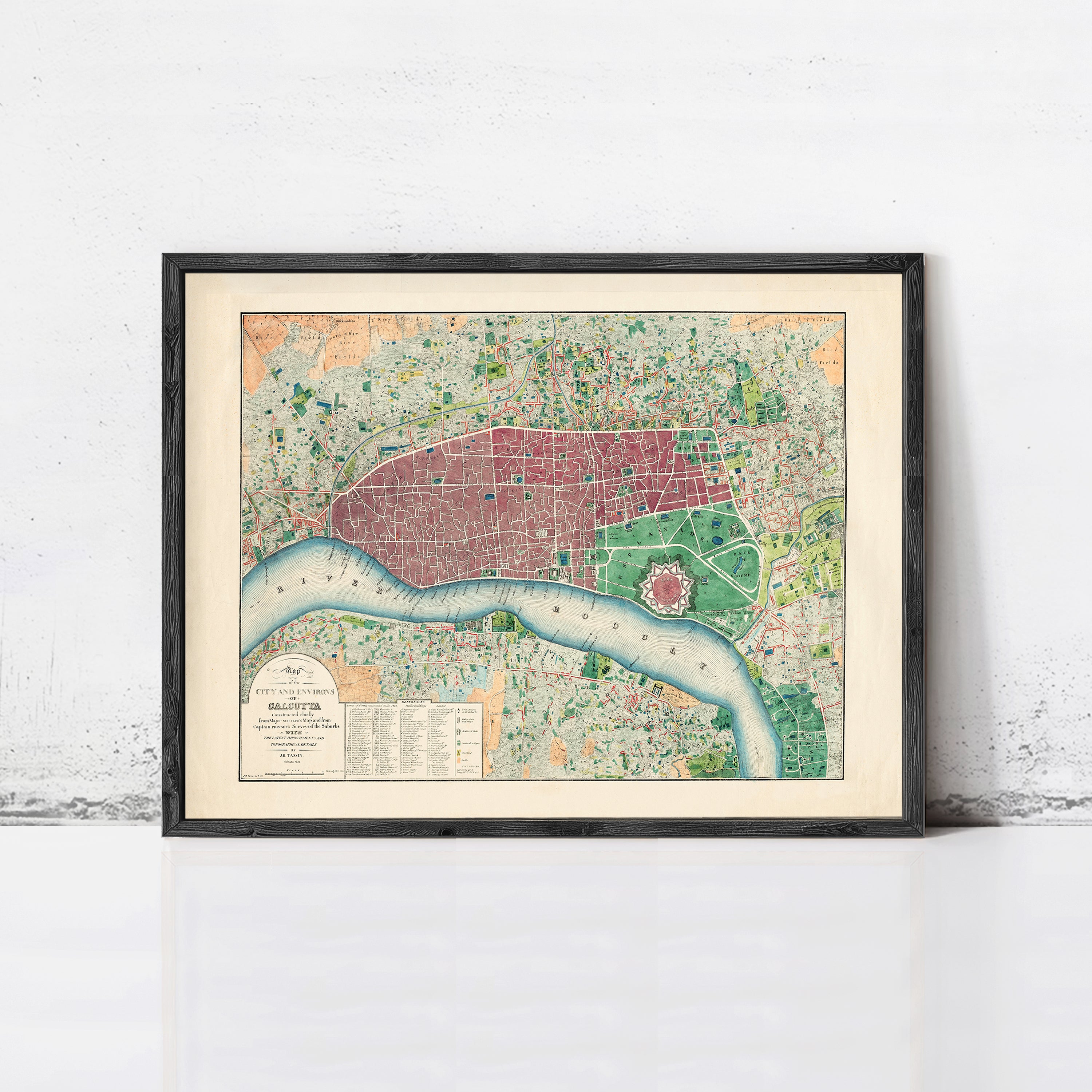 The image is a framed vintage map of London, England, depicting the city's streets and landmarks.