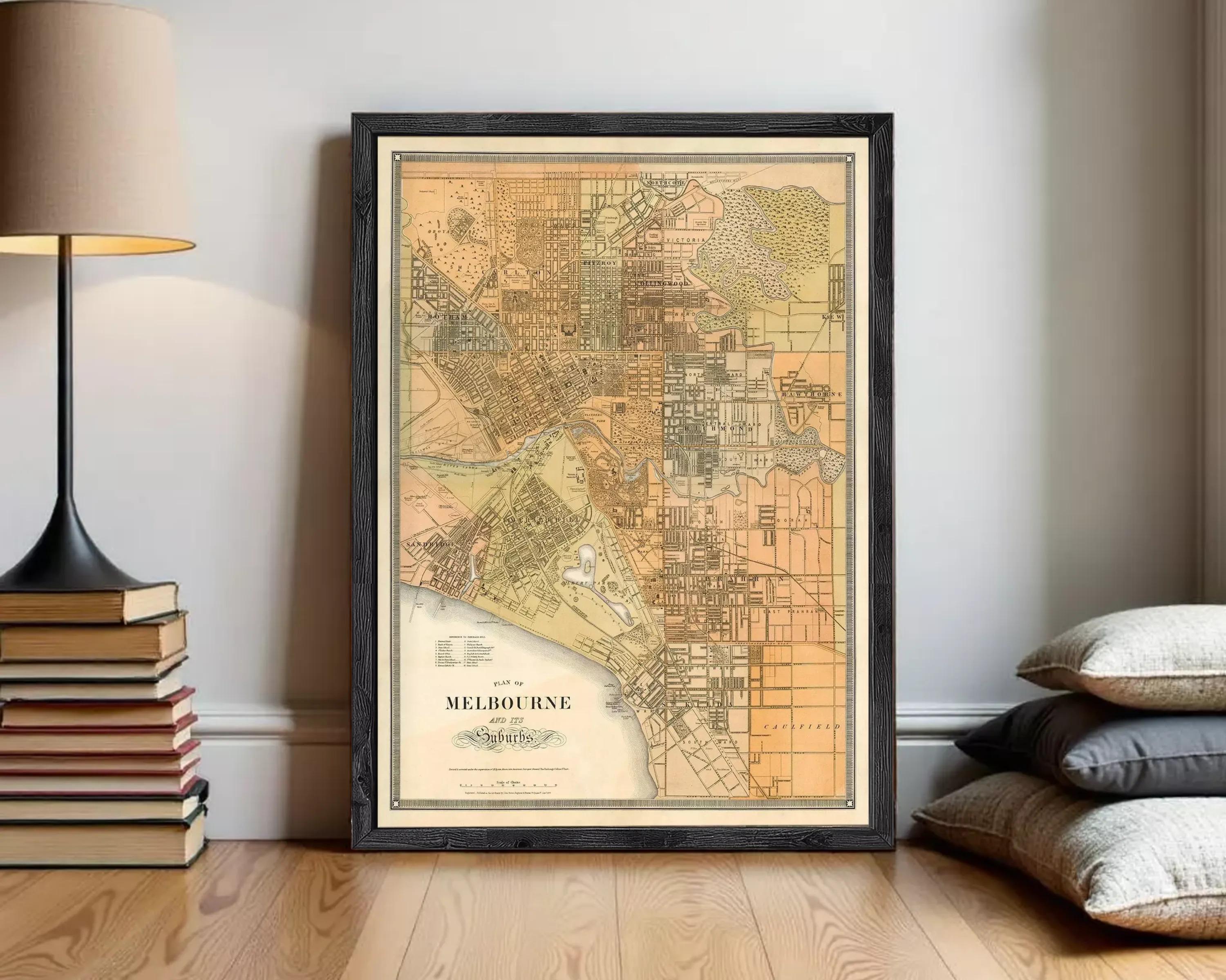 The image is a framed vintage map of Melbourne, Australia, depicting the city's layout and surrounding areas.