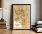 The image is a framed vintage map of Melbourne, Australia, depicting the city's layout and surrounding areas.