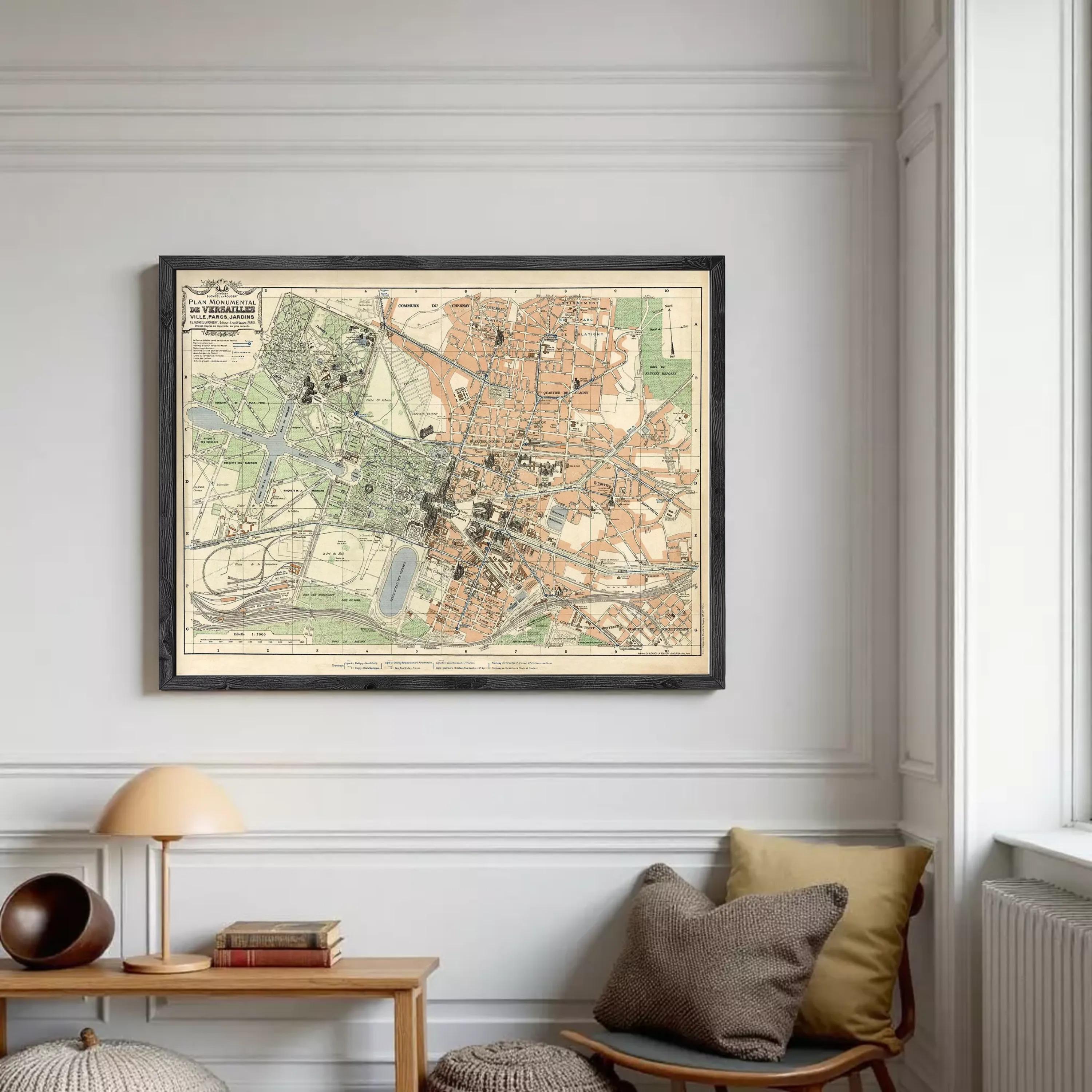 The image is a framed vintage map of a city, depicting various landmarks and streets in a detailed manner.