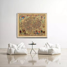 a large, colorful map of a city hanging on a white wall, with two white bean bag chairs positioned in front of it.