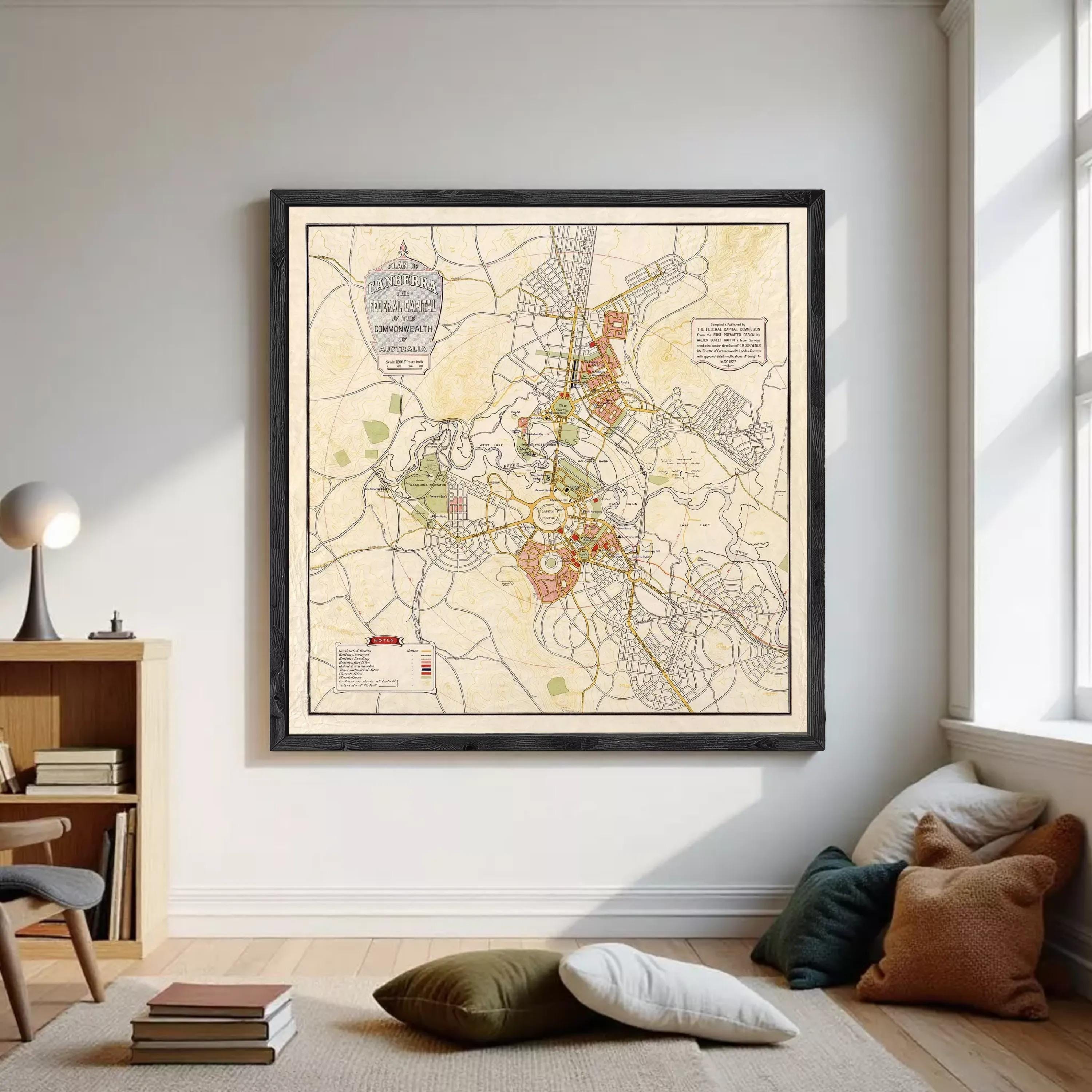The image is a framed map of a city, depicting various streets, landmarks, and other geographical features.