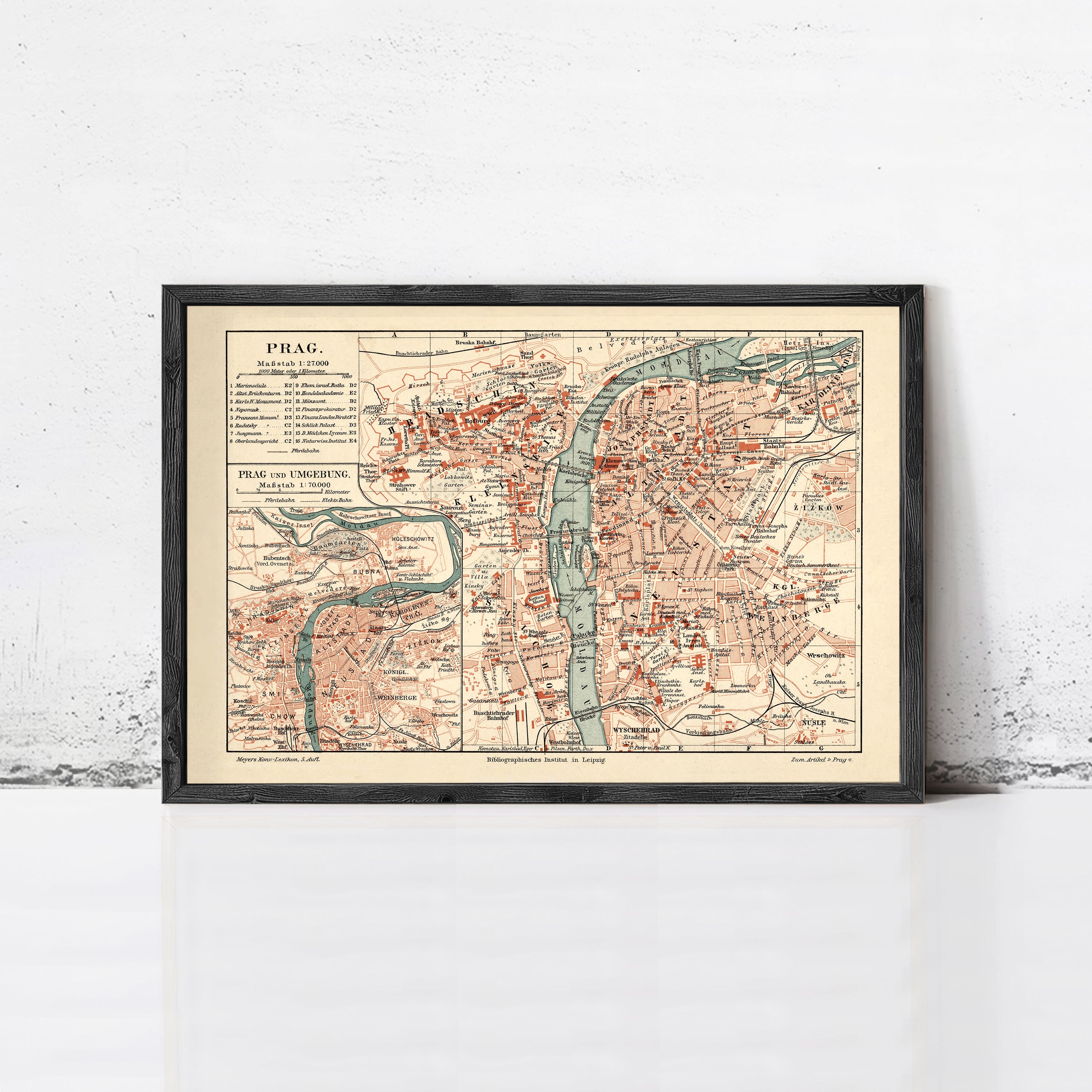 The image is a framed vintage map of Prague, Czech Republic, depicting the city's streets and landmarks.