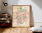 The image is a framed map of Plano, Texas, showing various streets, neighborhoods, and landmarks.
