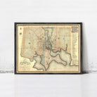 The image is a framed antique map of a city, likely Washington, D.C., with detailed cartography and geographical information.