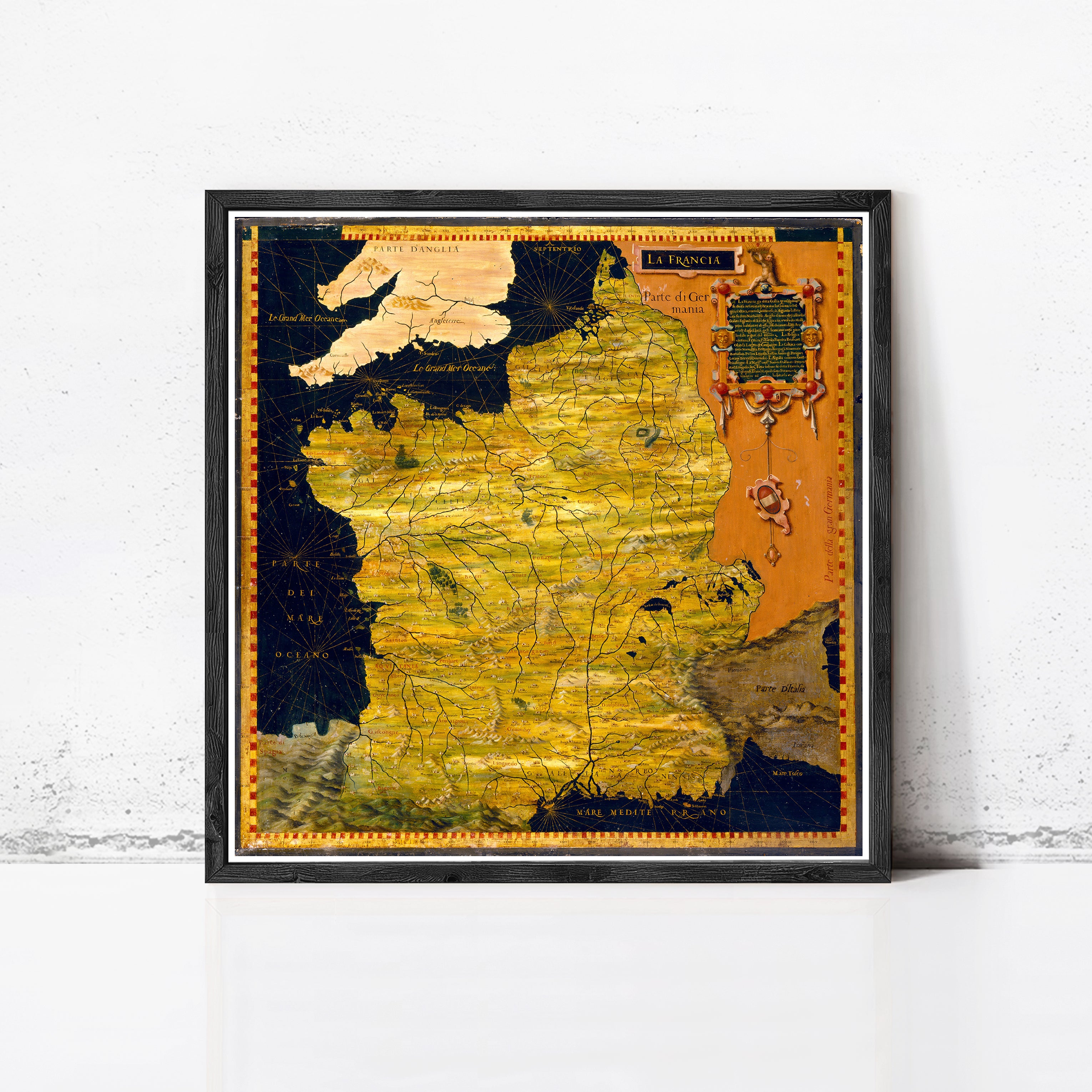 The image is a framed map of France, with a black border and a colorful, detailed map of the country.