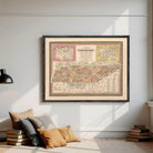 A framed vintage map of Tennessee, showing the state's geographical layout and boundaries.