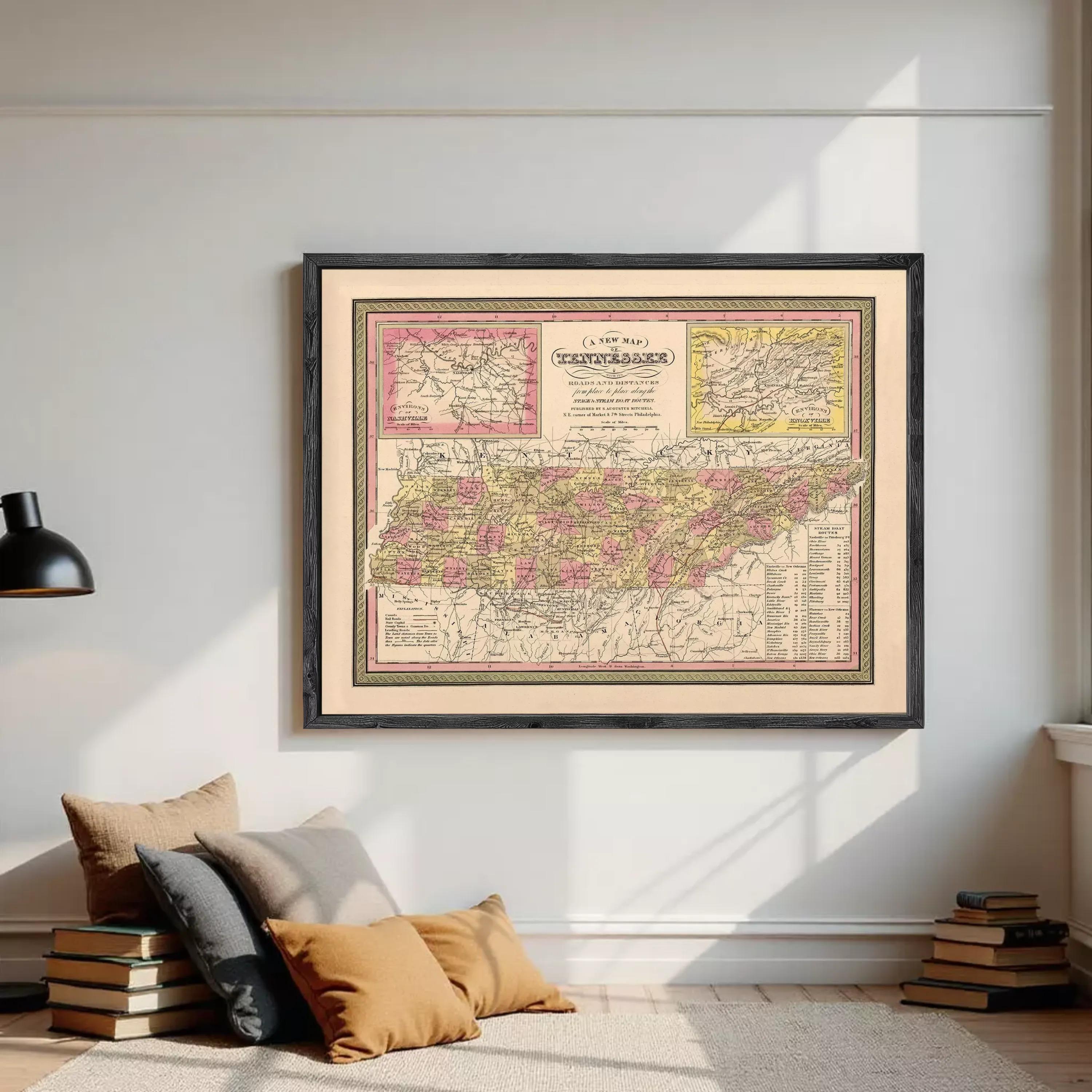 A framed vintage map of Tennessee, showing the state's geographical layout and boundaries.