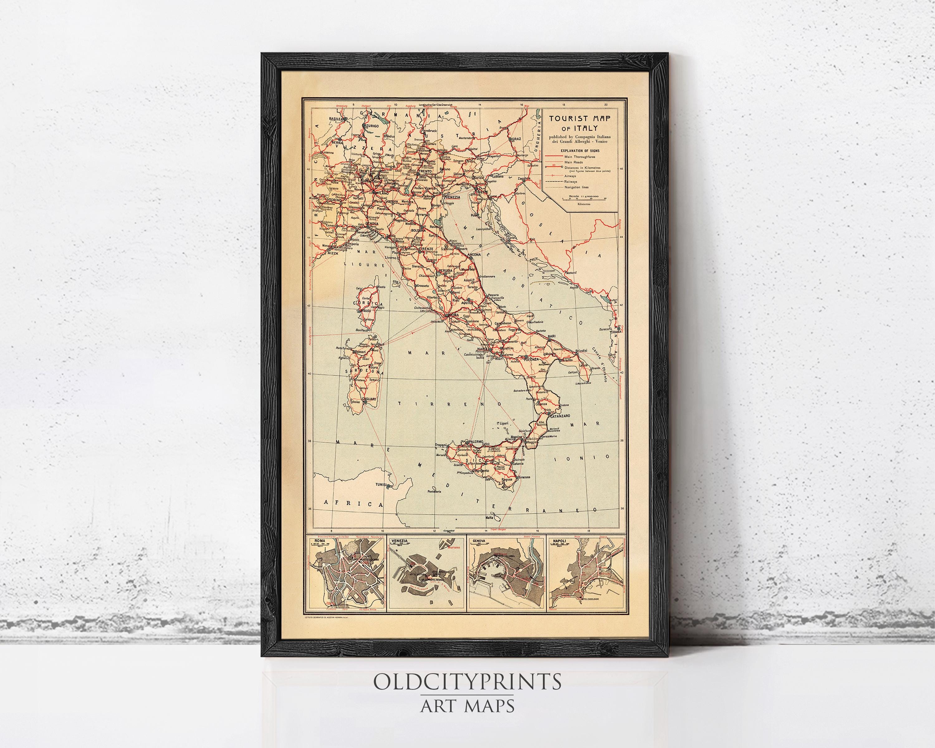 The image is a framed vintage map of Italy, depicting the country's geographical layout and surrounding areas.