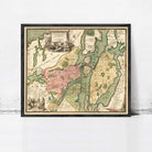The image is a framed antique map of a city, likely from the 18th century, with detailed cartography and illustrations.