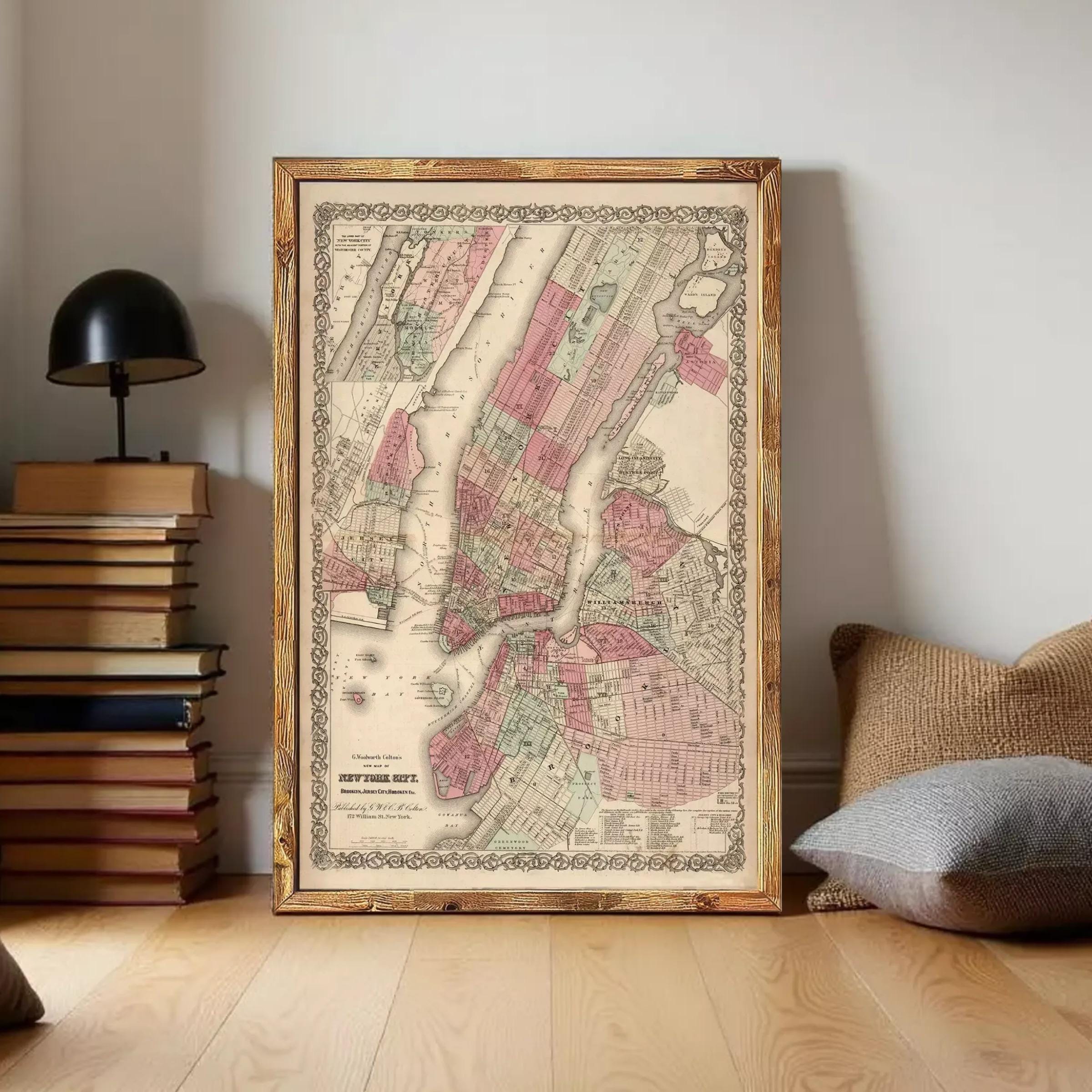 The image is a framed vintage map of New York City, depicting the city's streets and neighborhoods in a detailed and colorful manner.