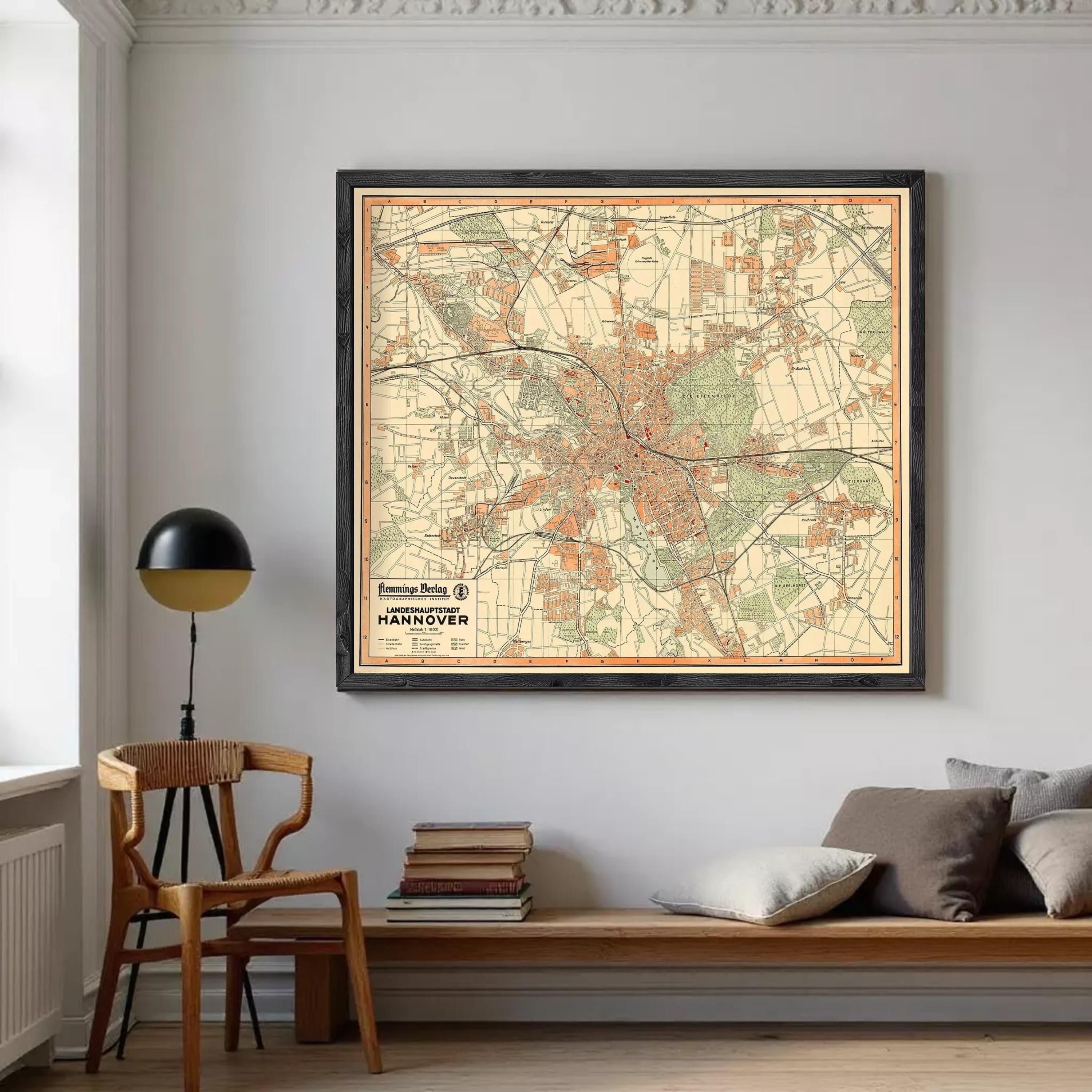 The image is a framed vintage map of the city of Hannover, Germany, depicting the city's streets, landmarks, and surrounding areas.