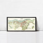The image is a framed map of a city, likely a historical or geographical map, displayed on a white wall.
