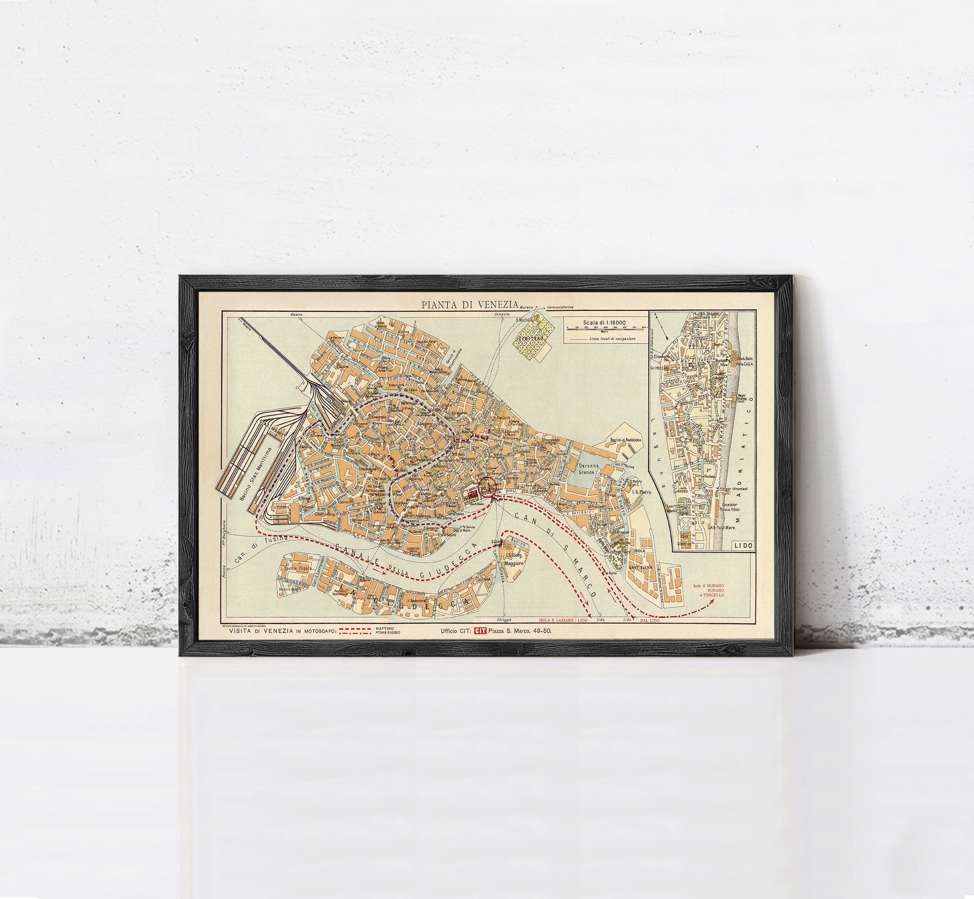 The image is a framed vintage map of Venice, Italy, depicting the city's layout and waterways.