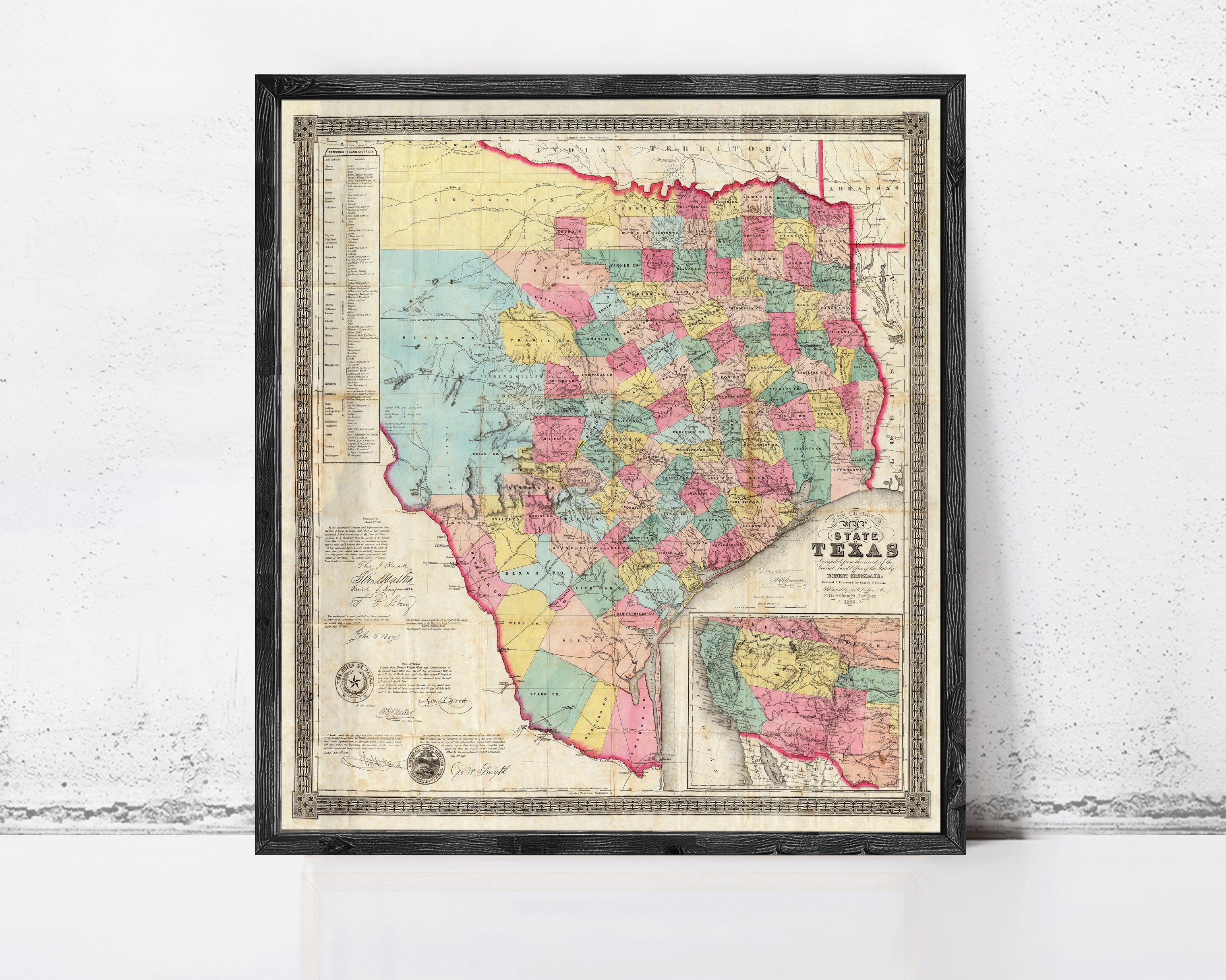 The image is a framed vintage map of Texas, depicting the state in a detailed and colorful manner.