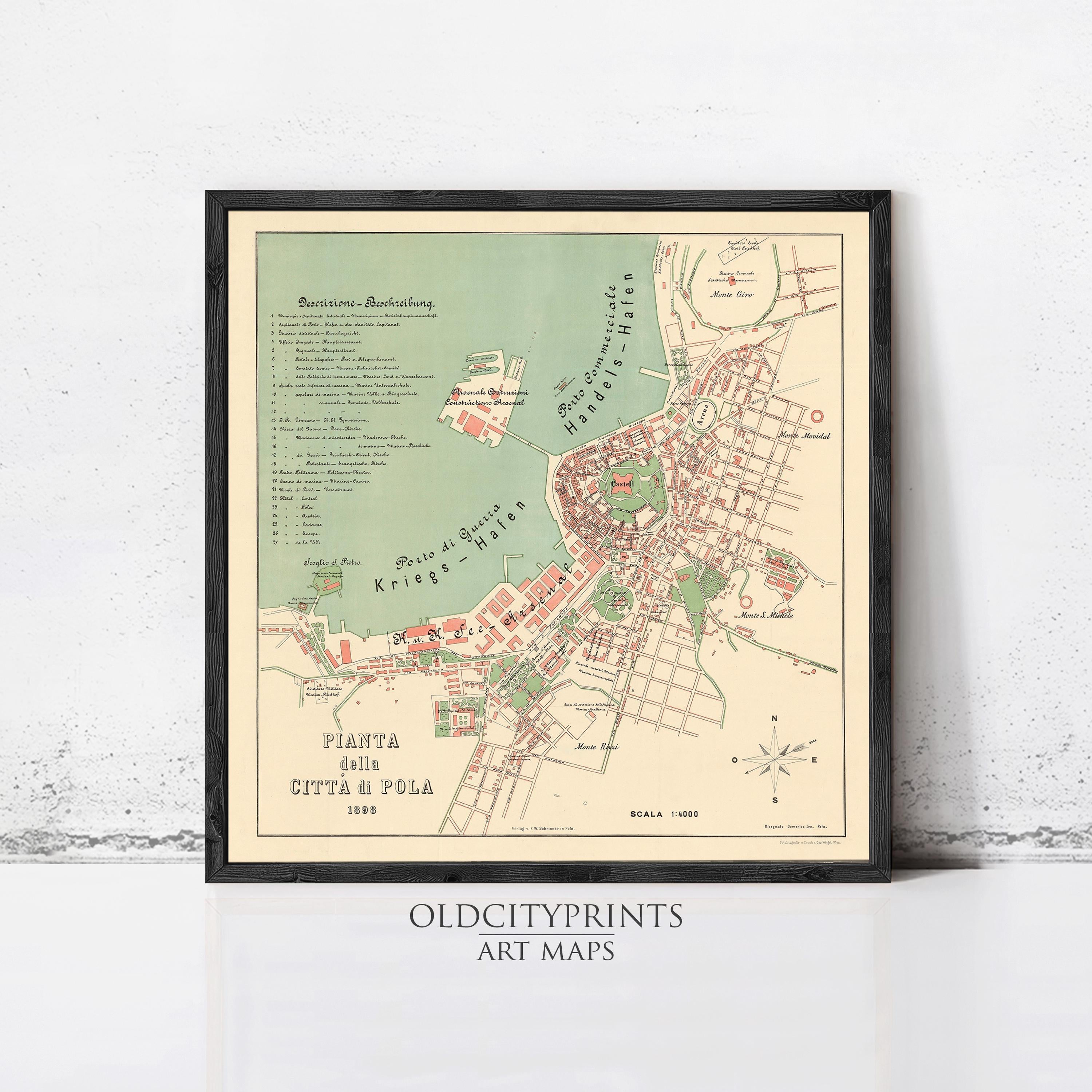 The image is a framed vintage map of a city, depicting the city's layout and surrounding areas.