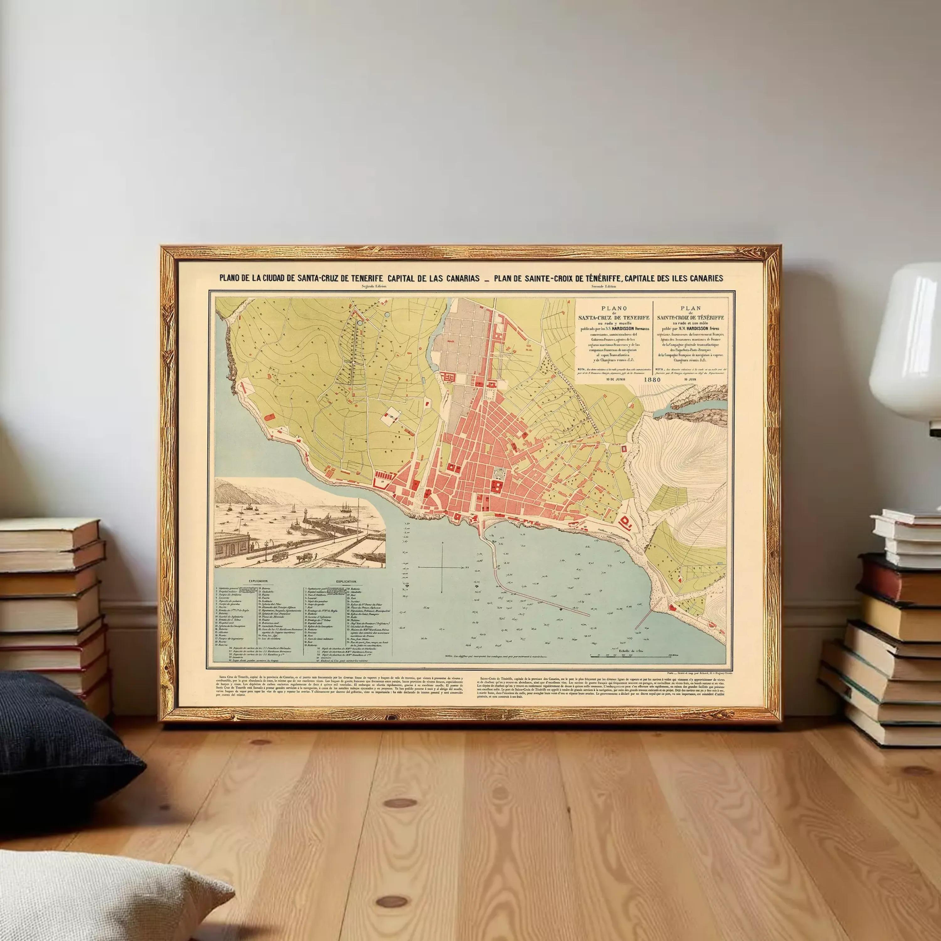 The image is a framed map of a coastal city, likely a coastal city in the Caribbean or Mediterranean region. The map appears to be vintage and features a detailed layout of the city, including streets, landmarks, and bodies of water. The map is framed and displayed on a wall, providing a clear view of the city's layout and geographical features.
