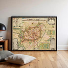 a large framed map of a city, with various landmarks and streets depicted.