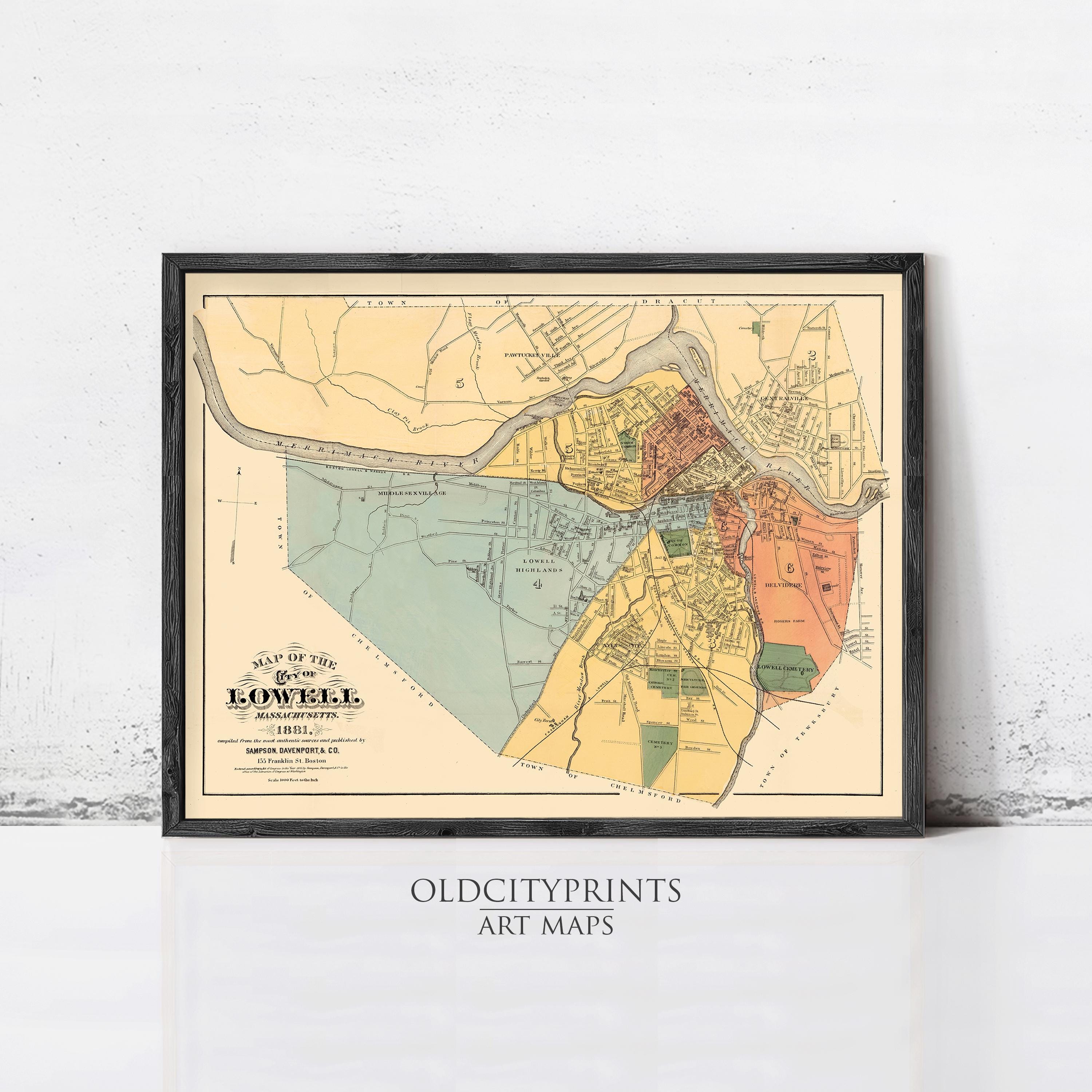The image is a framed vintage map of Lowell, Massachusetts, depicting the town and surrounding areas in a detailed and colorful manner.