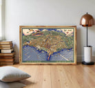 The image is a framed map of a city, depicting various landmarks and streets.