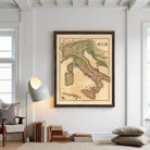 The image is a framed vintage map of Italy, depicting the country's geographical layout and surrounding areas.