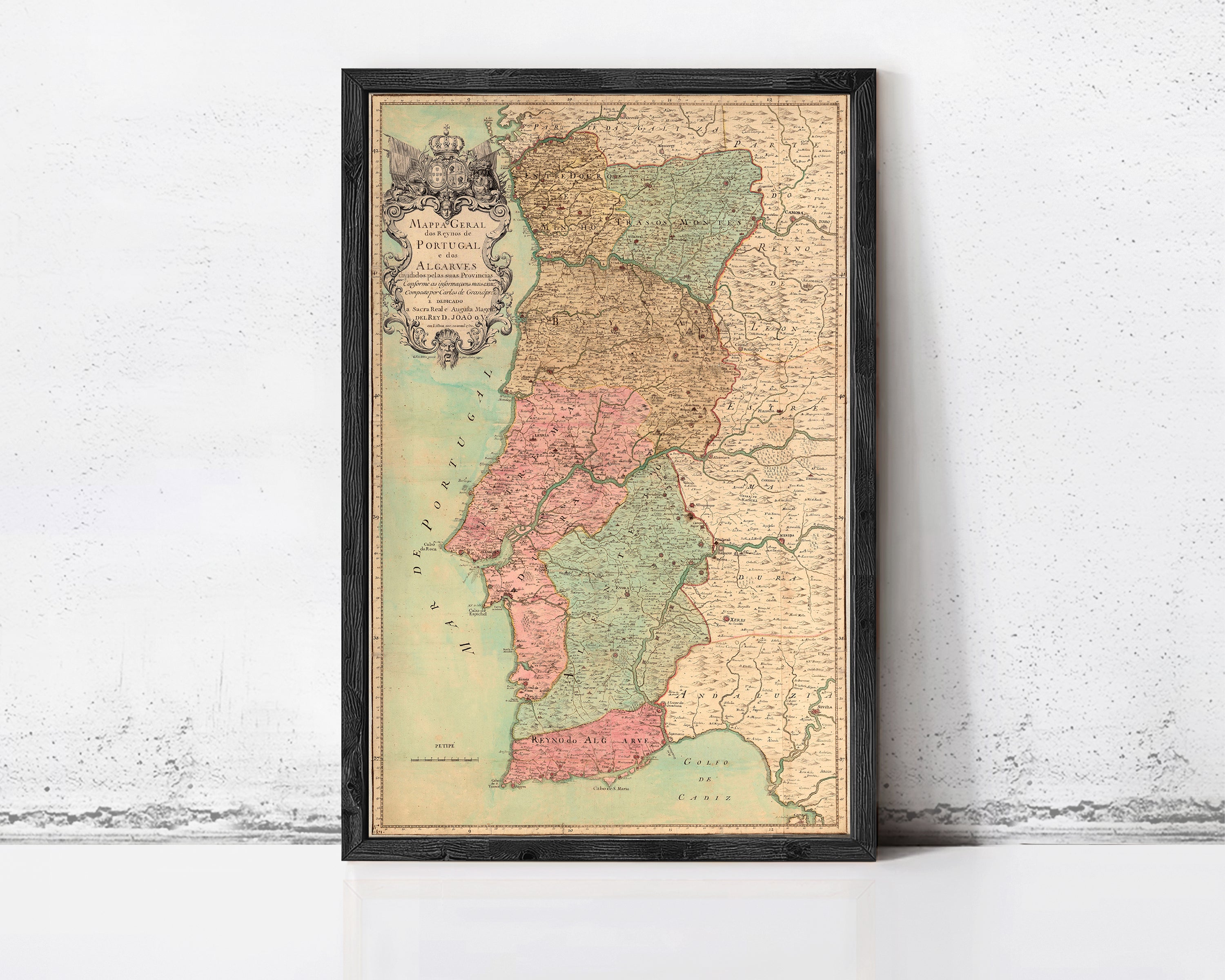 The image is a framed vintage map of Portugal, showing the different regions and their geographical features.