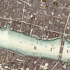 The image is a detailed map of a city, showing streets, buildings, and a large body of water.