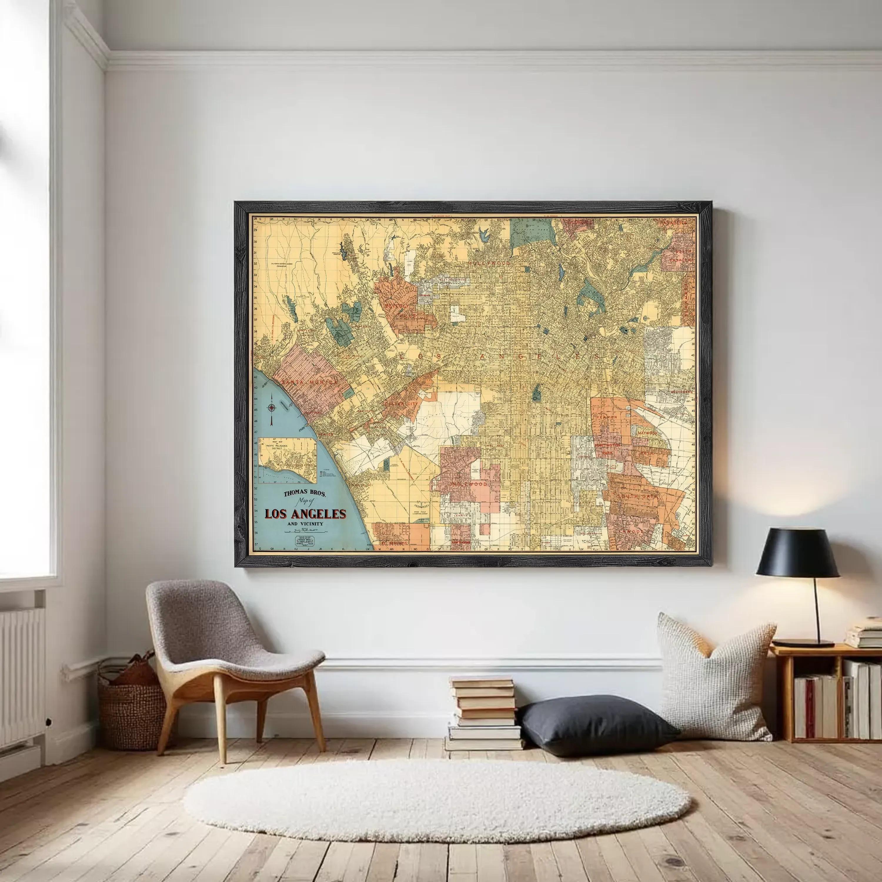 A framed vintage map of Los Angeles, California, with a vintage color palette and detailed street grid.