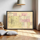 The image is a framed map of the city of Lincoln, showing the layout of the city and surrounding areas.